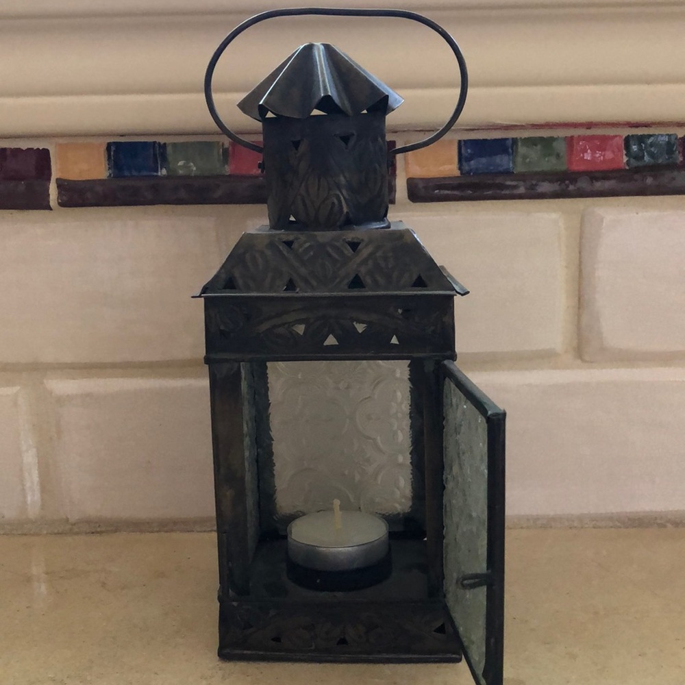 Small lantern. Holds a tea or a votive candle.
